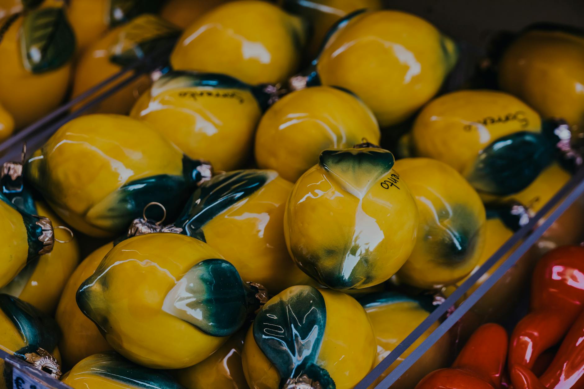 Fresh yellow lemons arranged on soft green background, symbolizing slow, intentional pleasure